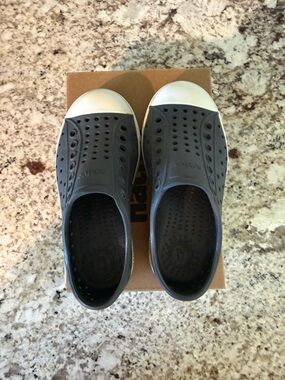 Native Jefferson Slip-On Sneakers in dark grey with White Toe